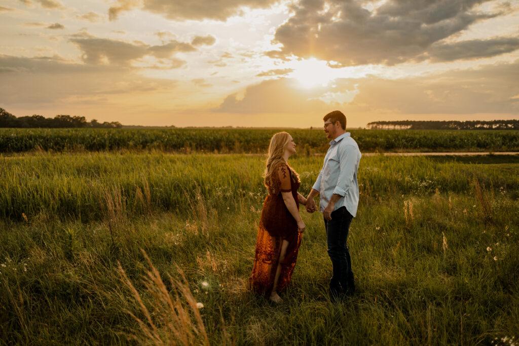 Benefits of Eloping is having two people in a field at sunset