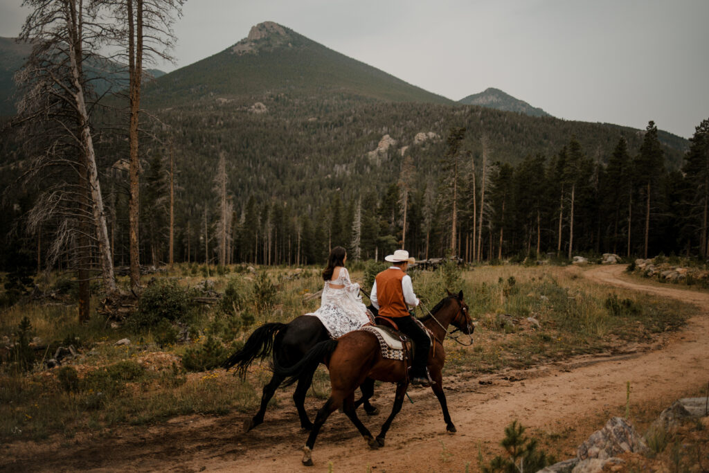 Couple horse riding captured by Colorado elopement photographer